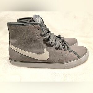 Nike mid high leather sneakers.